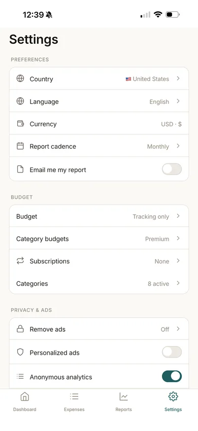 Settings screen with country, language and currency, budget options, and separate switches for personalized ads and anonymous analytics.